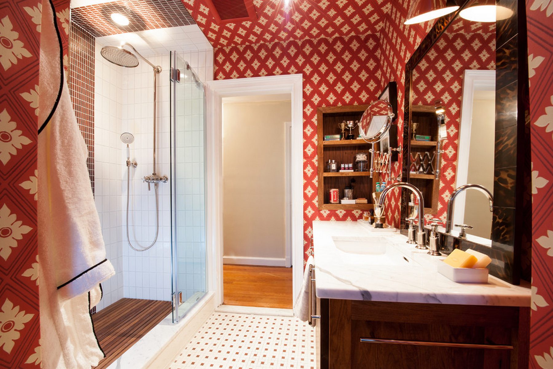 The Scarlet Bath — red ikat wallpaper, walnut vanity, and marble mosaic at the DC Design House by Christopher Patrick Interiors